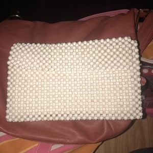 White bead clutch